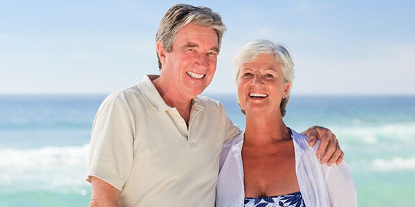 Happy Couple Smiling with Great White Teeth