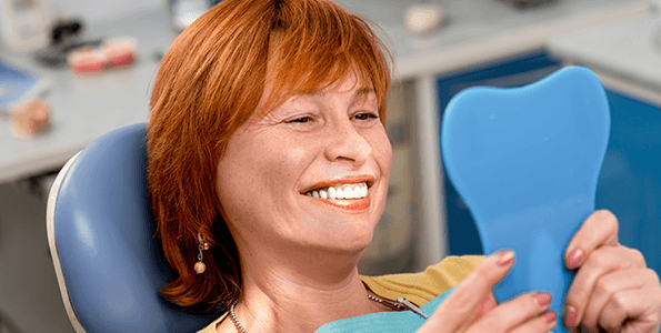 What are the problems with dental implants?